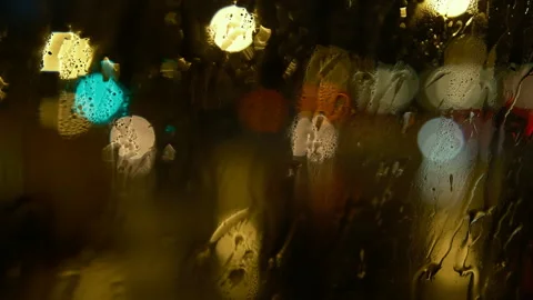 Rain seen through the windshield of a car, night inside of car, season rain Stock Footage 285943609