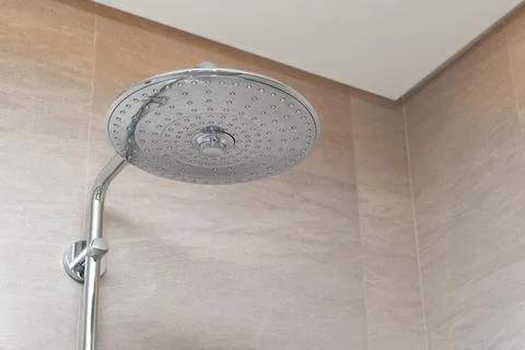 Rain shower head in bathroom, interior decoration Stock Photos
