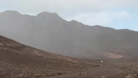 Rain shower moving across desert mountain valley dramatic clouds timelapse 스톡 동영상 331180718