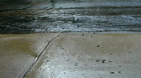 Rain on Sidewalk Stock-Footage 12275032