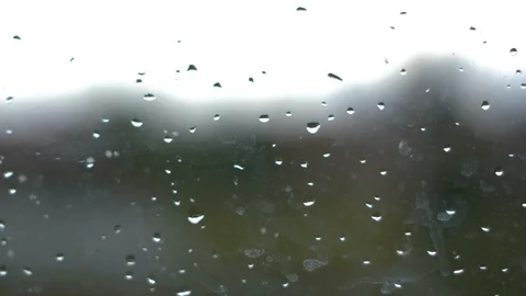 Rain sitting on the window in a rainy and dark day Stock Footage 112282093