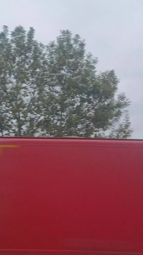 Rain Sky and Clouds over England UK During Car Drive Stock Footage 320527514