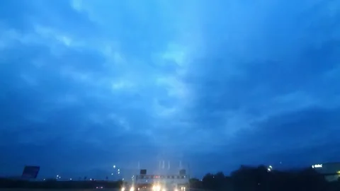 Rain Sky and Dramatic Black Clouds over England During Drive Stock Footage 321167832
