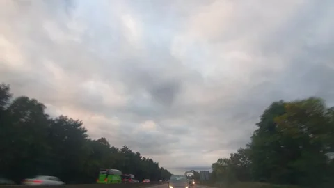 Rain Sky and Dramatic Black Clouds over England During Drive Stock Footage 321182561