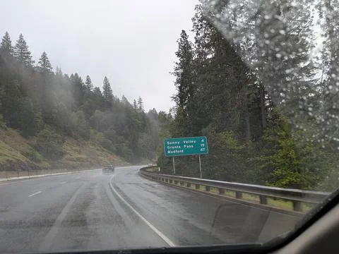 Rain-slicked highway view looking toward Sunny Valley, Grants Pass, and Medford Stock Photos