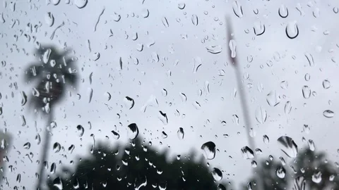 Rain slides window with flag backgroud Stock Footage 99314299