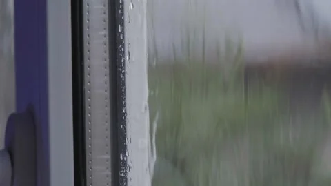 Rain in slow motion. Raindrops falling in slow motion. Raindrops close-up Stock Footage 264540946