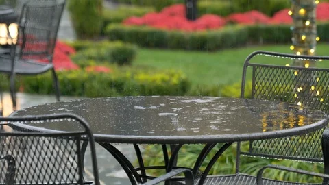 Rain slow motion on top of table outside Video stock 120303483