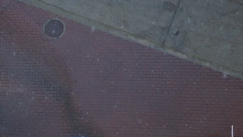 Rain in Sochi. time is closer to sunset. raindrops run down the road Stock Footage 115543430