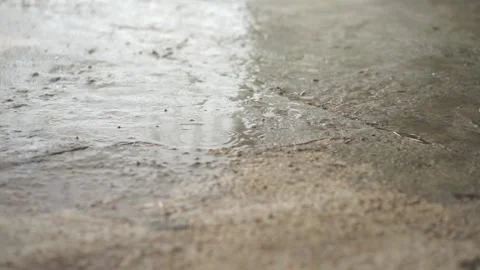Rain Splashing Drops on Pavement Floor 動画素材 249760304