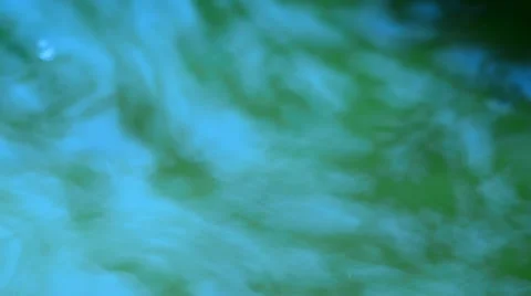 Rain splashing on surface of water Stock Footage 10917547