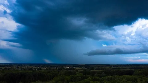 Rain Storm and Clouds in Distance at Sunset - 4K Aerial Hyperlapse Stock Footage 94642727