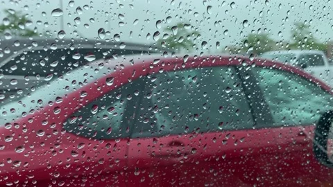 Rain Storm - Drops on Window - Person gets in Car Stock Footage 195908153