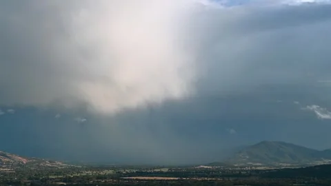 Rain storm moving through Kiewa Valley in North East Victoria Stock Footage 322076778