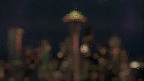 Rain Streaked Night View of Space Needle and Seattle Skyline Through Window Stock Footage 336303851