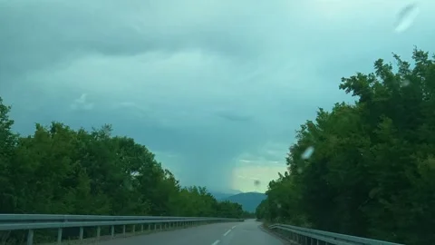 Rain streaks the windshield. Balkan Mountains, Serbia 스톡 동영상 341876944