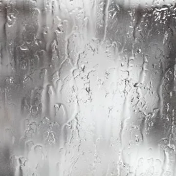 Rain streams on window Stock Photos