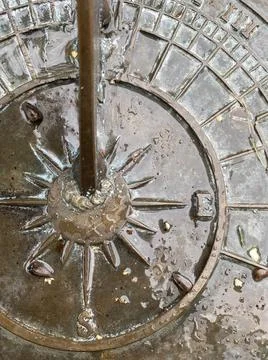 Rain on a Sundial Macro Stock Photos