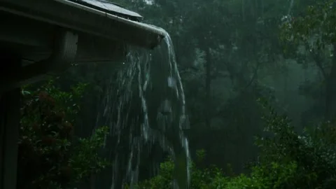 Rain Surging over Gutter in Residential Home Vídeos de archivo 337803171