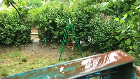 Rain Swing Children's Playground Reflection Stock Footage 197766424