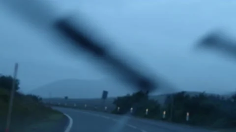 Rain through a car with a windscreen on a dark road Stock Footage 219508488