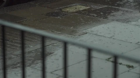 Rain through railings - close up Stock Footage 93208133
