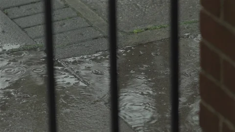 Rain through railings - close up Stock Footage 93208208