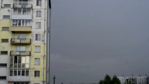 Rain in the urban environment on the background of multi-storey apartment buildi Stock Footage 94055476