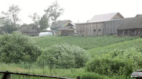 Rain in the village Stock Footage 11252780