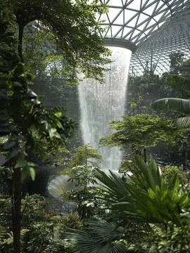 The Rain Vortex indoor waterfall and jungle at Jewel Changi Airport, Singapore Stock Photos