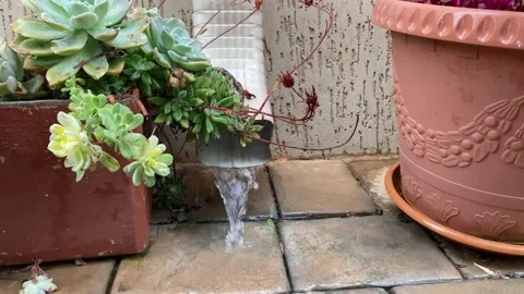Rain water from aluminium gutter Stock Footage 169391015