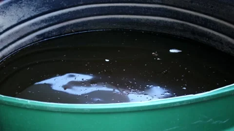 Rain water in a container Stock Footage 200513811