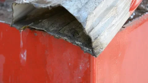 Rain water dripping from the drain. Rain water coming out of roof gutter drainag 스톡 동영상 170151645