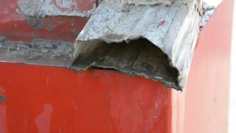Rain water dripping from the drain. Rain water coming out of roof gutter drainag Stock Footage 170151649