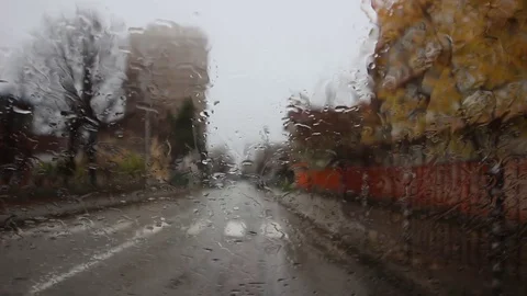 Rain water drops on the car window Video stock 71368553
