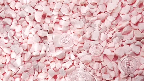 Rain water drops falling in slow motion and creating water waves, splashes .. Stock Footage 297744857