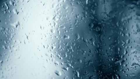 Rain water drops on glass surface, abstract spring rainy weather background Stock Footage 102235152
