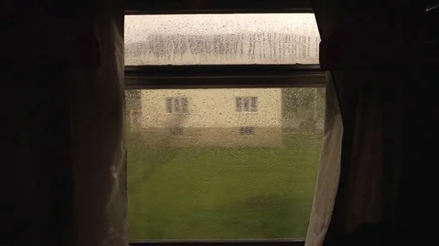 Rain Water Drops on Train Window Glass. View from moving train window Landscape Video stock 114006031