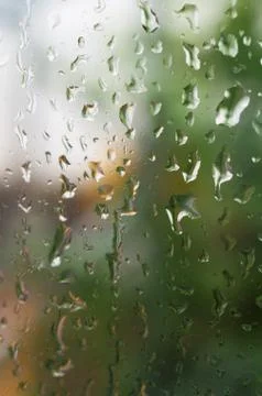Rain water drops on windows - selective focus Stock Photos
