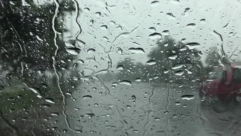 Rain water on glass moving in patterns Stock Footage 114394320