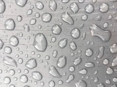 Rain water on grey background Stock-Fotos