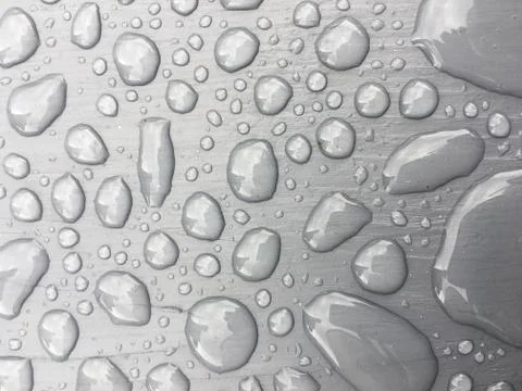 Rain water on grey background Foto stock