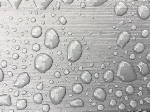 Rain water on grey background Stock Photos