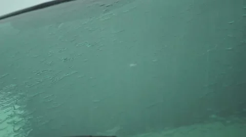 Rain Water Rolling Down Car Windshield Video stock 62867829