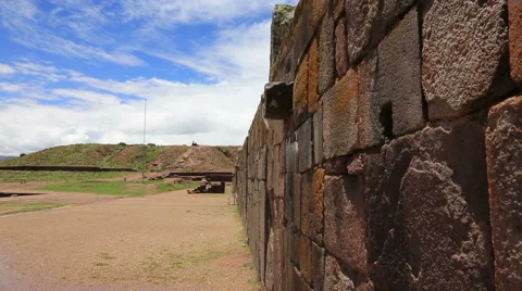 Rain water is streaming from drainpipe in the complex Puma Punku near Tiwanaku,  Stock Footage 60217058