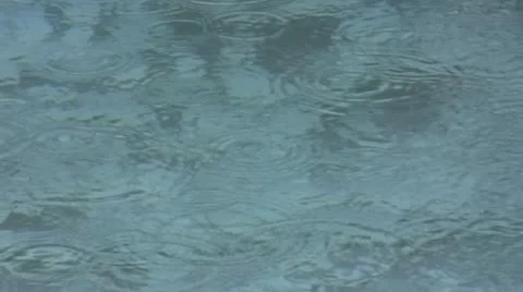Rain on water surface Stock Footage 10823169