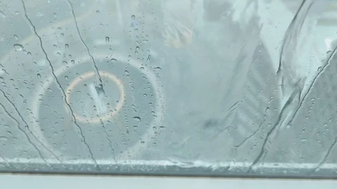 The rain water on the window Stock Footage 125815247