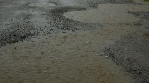 Rain waterdrops falling into dirty puddle 스톡 동영상 201790369