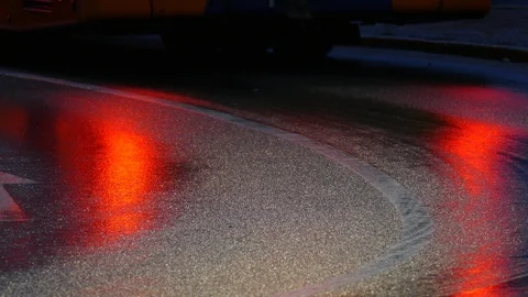 Rain wet road, lights, directional arrows in the rain at dusk, Bremen, German Stock Footage 100836013