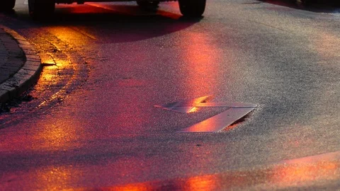 Rain wet road, lights, directional arrows in the rain at dusk, Bremen, German Stock Footage 100836595